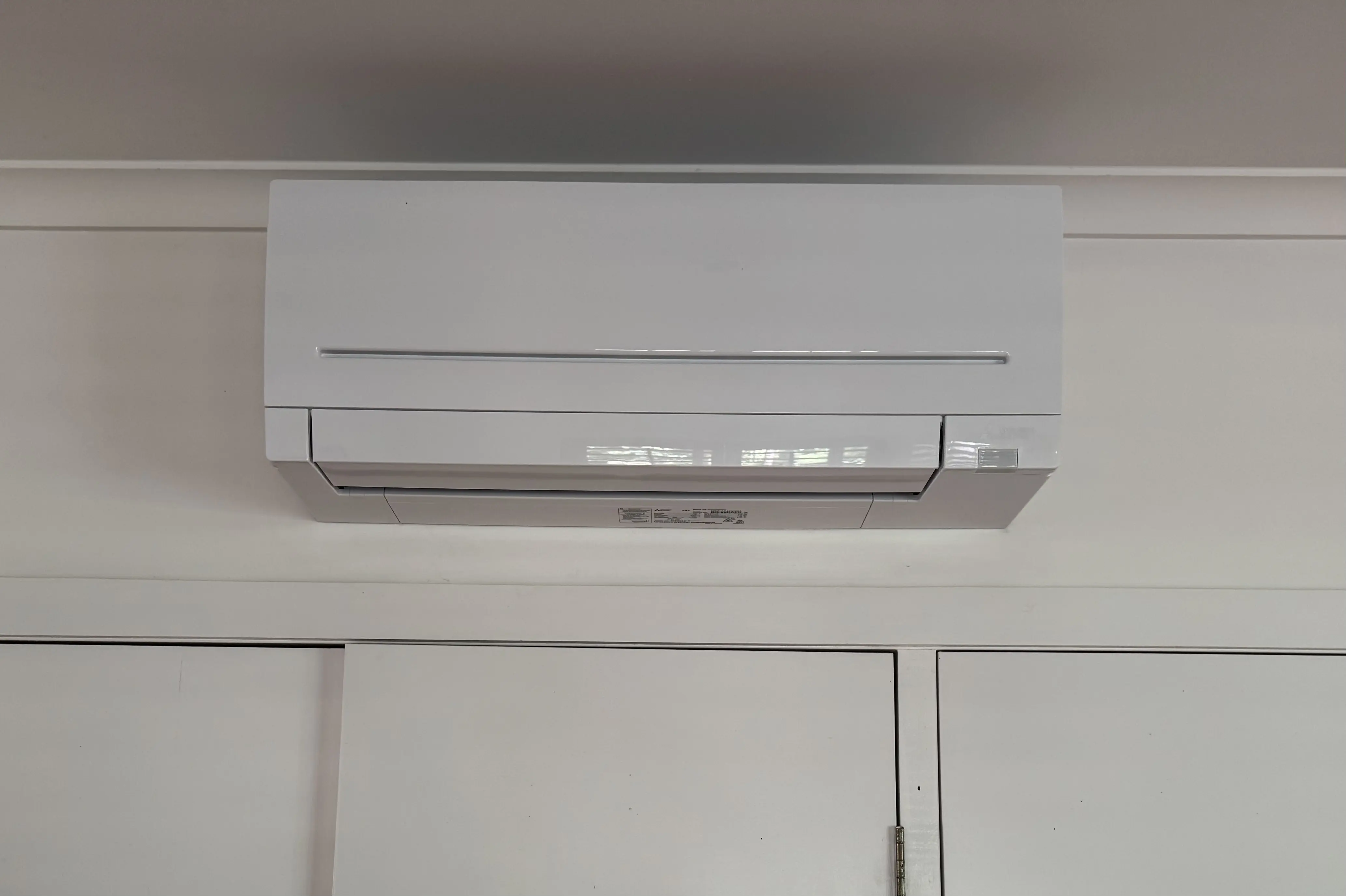 Securely mounted and leveled high wall split system indoor unit