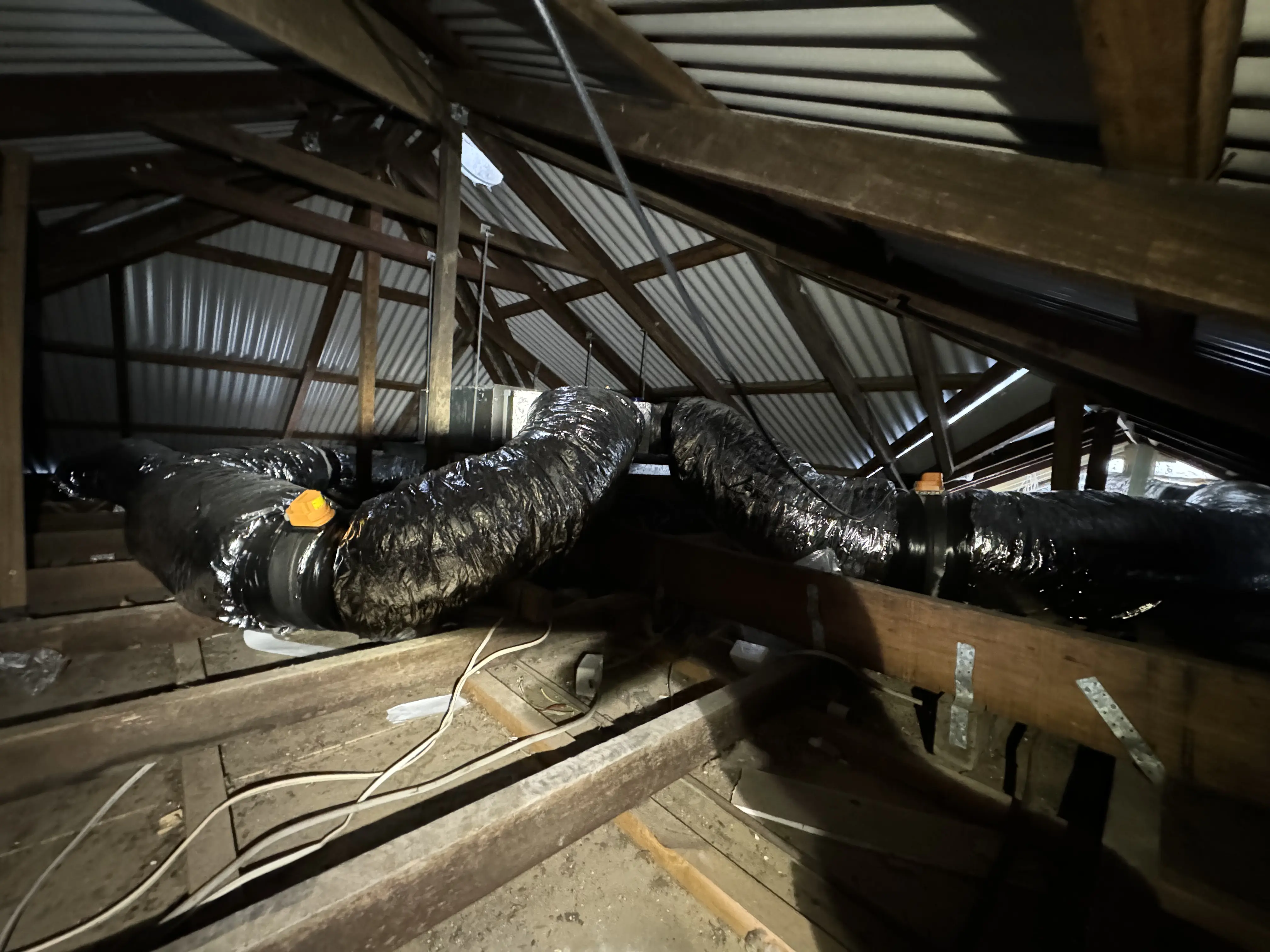 Attic roof space ducted fan coil unit install