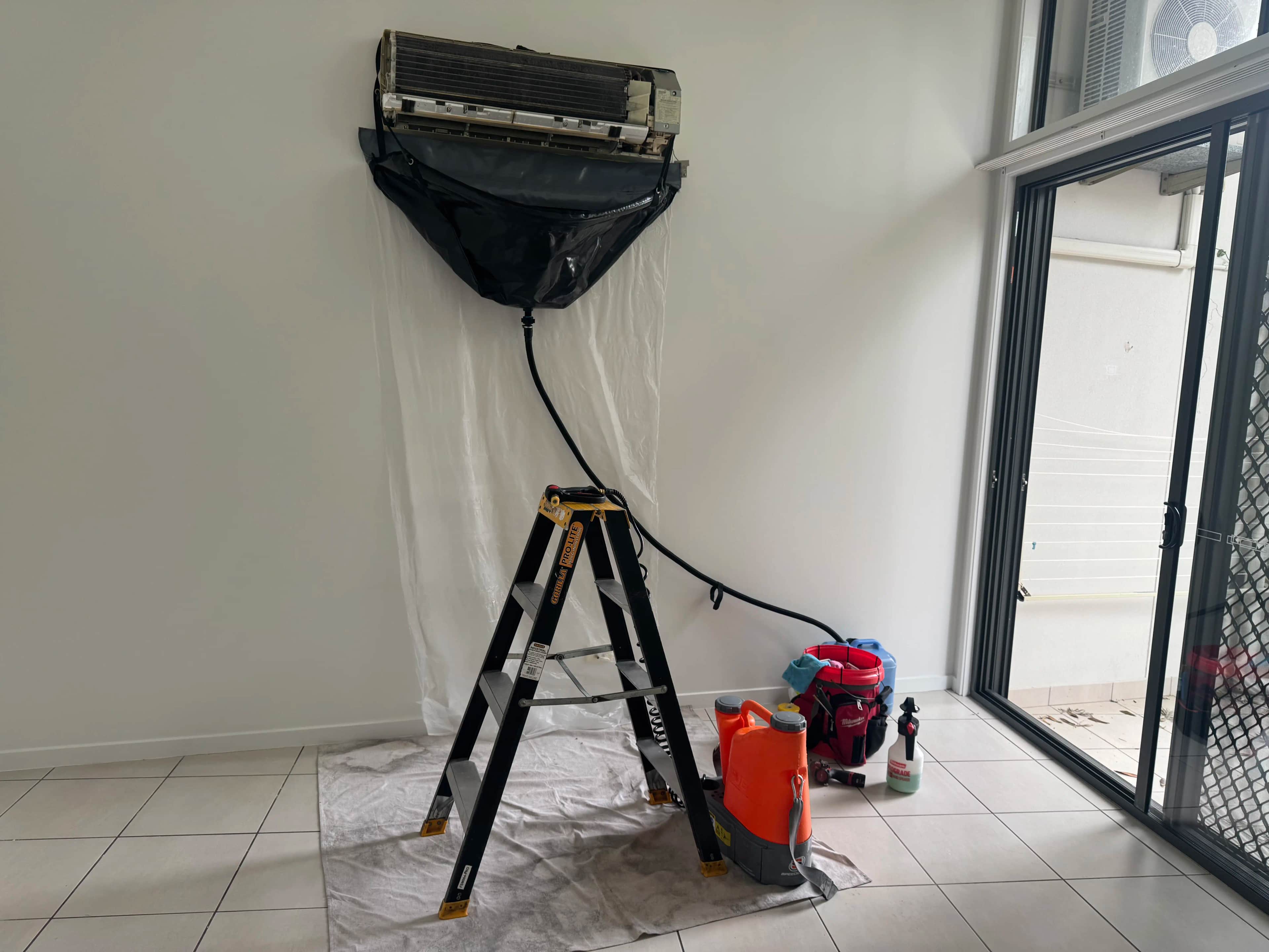 Sanitizing evaporator coils with specialized wash